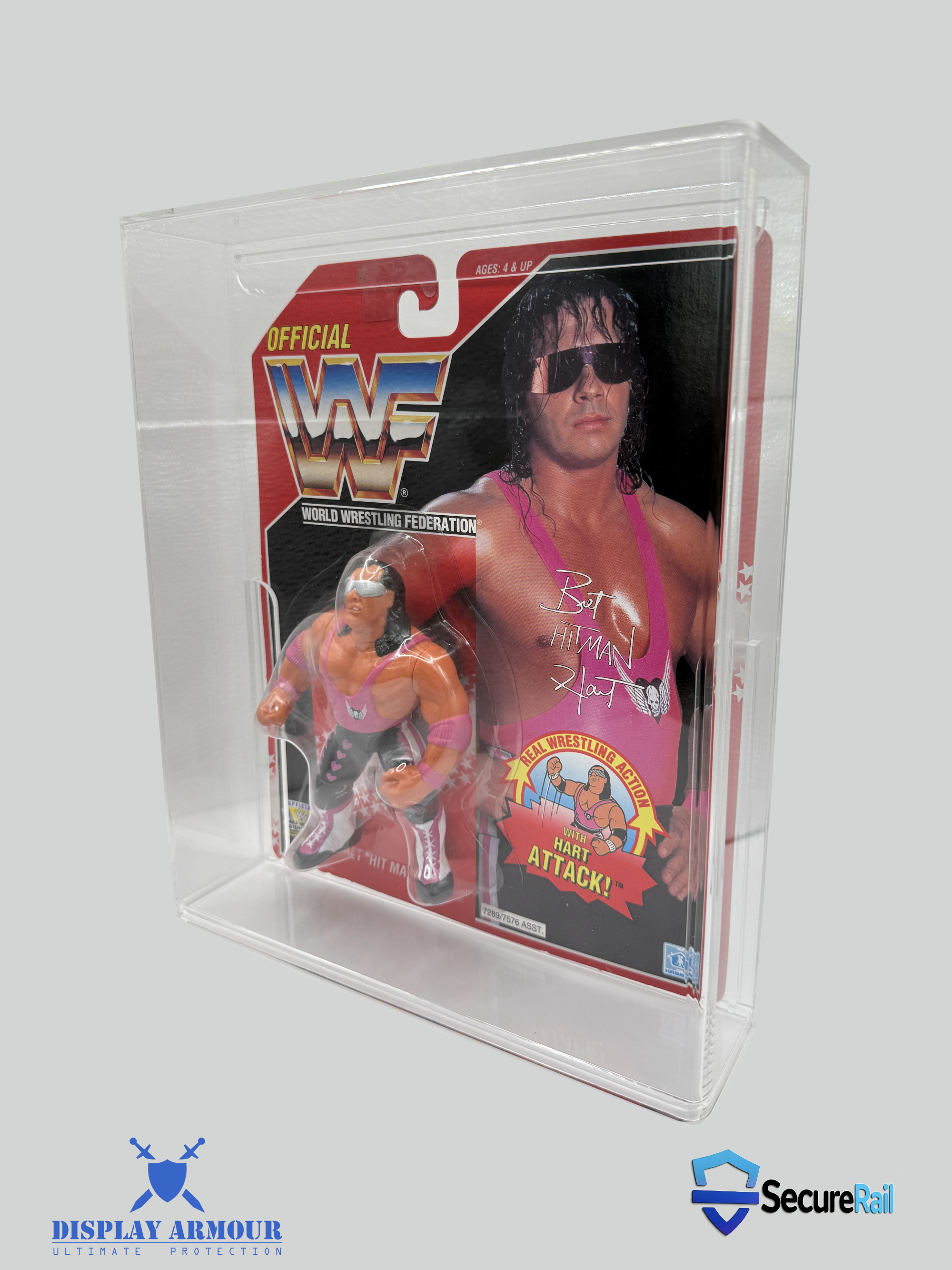 Side view of WWF Hasbro Bret Hart figure inside a Display Armour UV-protected acrylic display case with SecureRail™ support system.