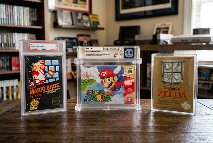 Graded Super Mario Bros., Super Mario 64 and The Legend of Zelda video games displayed together