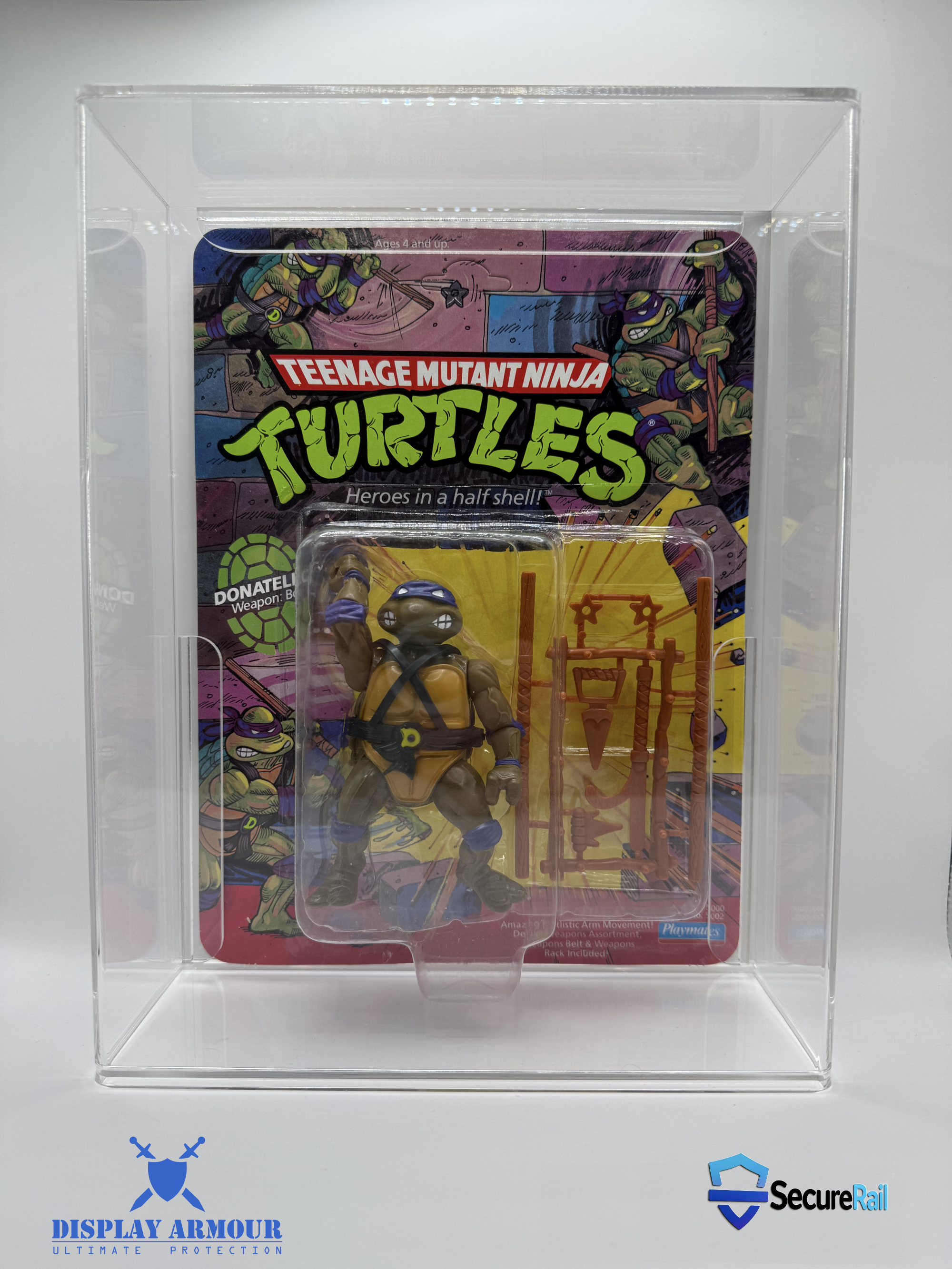 TMNT figure displayed in Display Armour case featuring SecureRail™ support and locking seal
