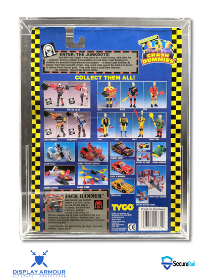 Back of a Tyco Crash Dummies action figure blister pack, showing collectible figure photos, product text, and a barcode inside a clear plastic case.