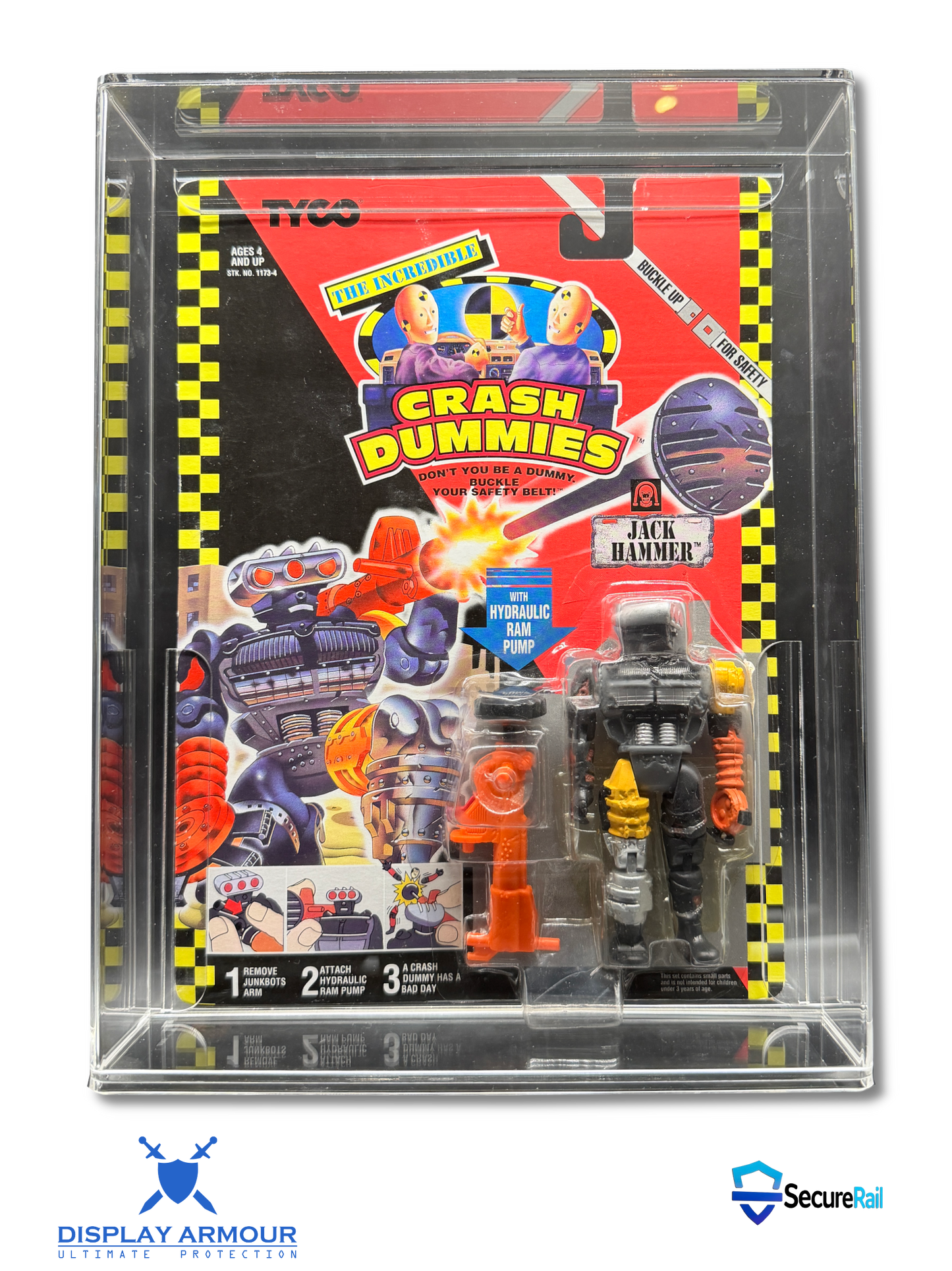 A packaged action figure displayed inside a clear acrylic case. The figure is from the TVC 'Crash Dummies' series and is labeled 'Jack Hammer'.