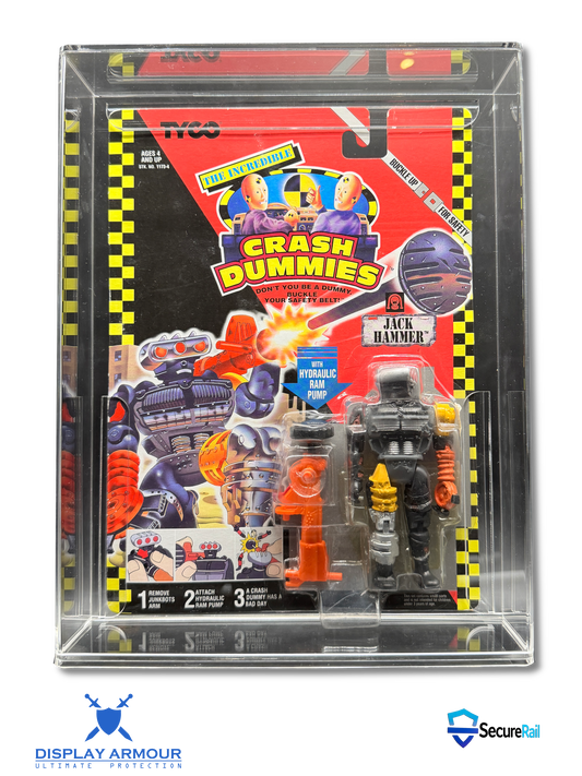 A packaged action figure displayed inside a clear acrylic case. The figure is from the TVC 'Crash Dummies' series and is labeled 'Jack Hammer'.