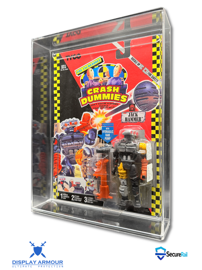 A packaged Crash Dummies action figure set inside a clear acrylic display case, photographed on a white background with Display Armour and Secure24 logos at the bottom.