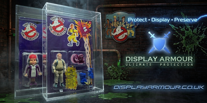 A Ghostbusters collectible figure displayed inside a clear acrylic protective case, set against a dark brick wall background with promotional text for Display Armour.