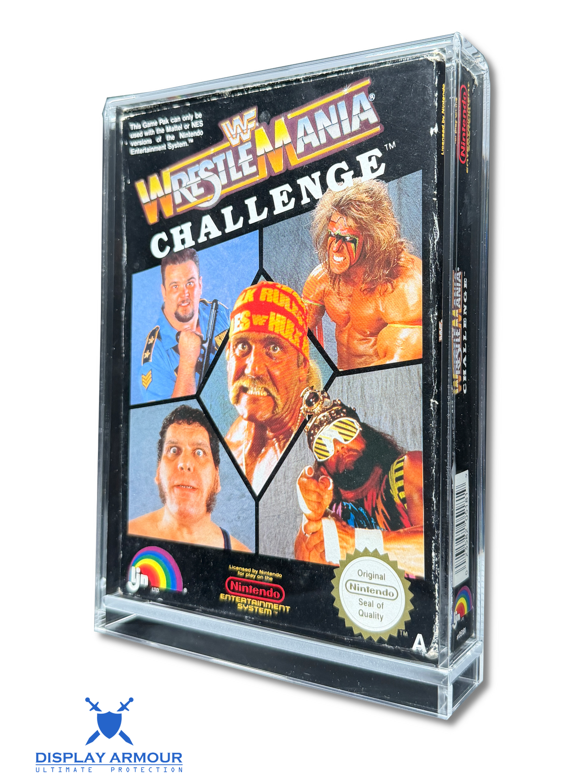 A clear plastic display case holding a vintage Nintendo NES game cartridge for WrestleMania Challenge. The cartridge cover features multiple color images of wrestlers, including Randy Savage and Bret Hart, with the WrestleMania logo at the top.