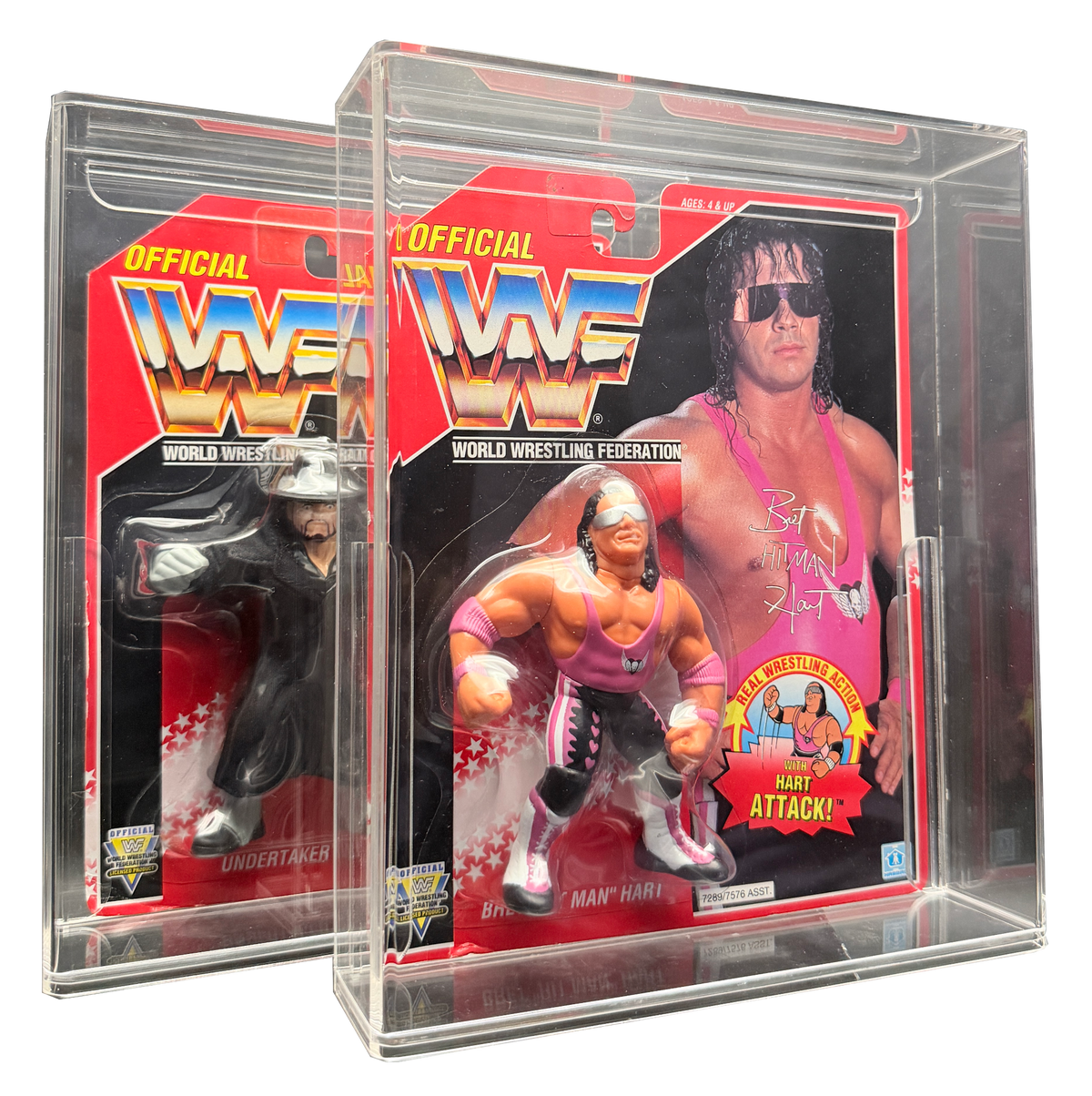 WWF Hasbro Undertaker and Bret Hart figures together in acrylic display cases banner image.